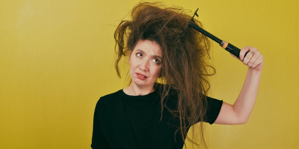 How Can I Tame Frizzy Hair Without Heavy Products?